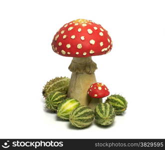 red white mushroom with green melons isolated on white