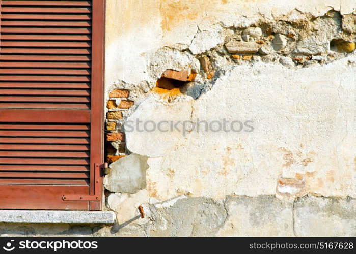 red window varano borghi palaces italy abstract sunny day wood venetian blind in the concrete brick