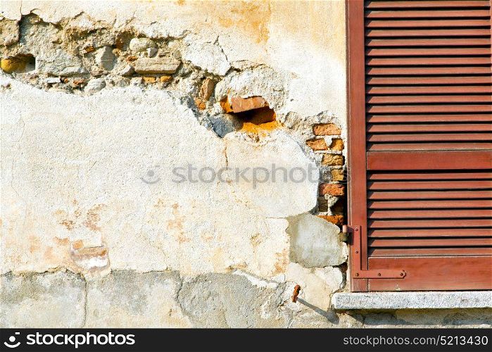 red window varano borghi palaces italy abstract sunny day wood venetian blind in the concrete brick