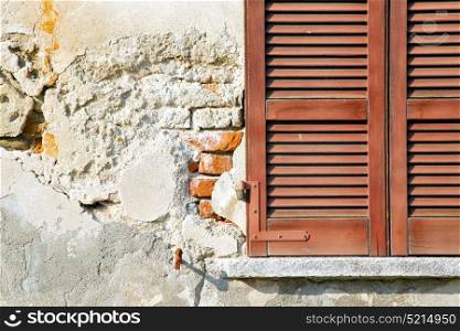 red window varano borghi palaces italy abstract sunny day wood venetian blind in the concrete brick