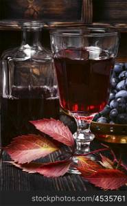 red wine and harvest of grapes