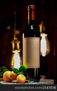 Red wine and ripe mandarins on a background of vintage lamps. Wine and mandarins