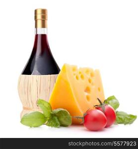 Red wine bottle, cheese and tomato still life isolated on white background cutout. Italian food concept.