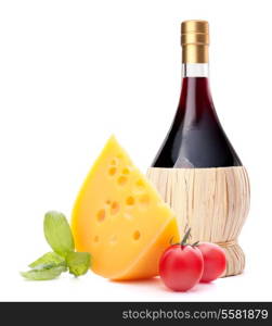 Red wine bottle, cheese and tomato still life isolated on white background cutout. Italian food concept.