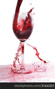 red wine flowing in transparent glass