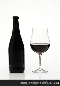 red wine glass and bottle