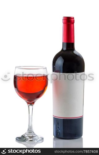 Red wine in glass with full bottle on side isolated on white background with reflection