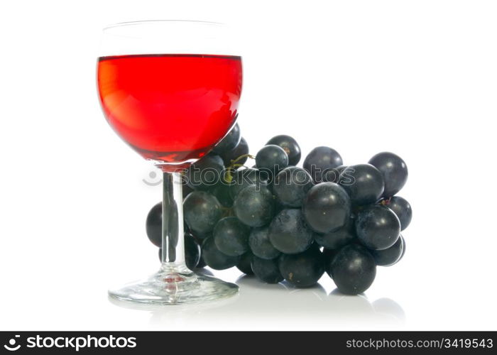 Red wine in glass with grape on white background