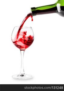 Red wine pouring into a glass isolated on white background. Red wine pouring into a glass