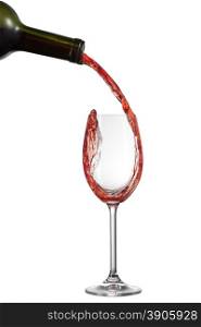 Red wine pouring into glass with splash isolated on white
