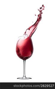 red wine splashing out of a glass, isolated on white