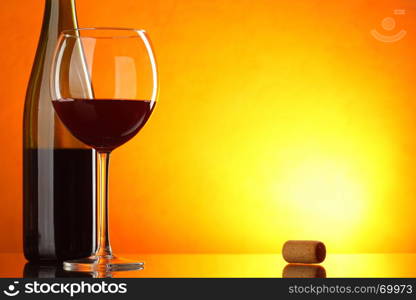 Red wine - still-life with glass and bottle with big space for text