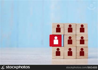 Red wooden block with white person icon on the building. People, Business, Human resource management, Recruitment, Teamwork, strategy and leadership Concepts