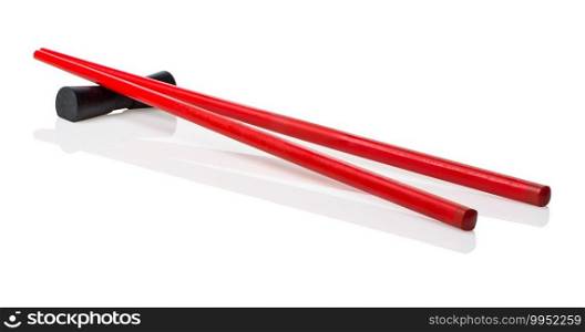 Red wooden chopsticks isolated on a white background. Red wooden chopsticks