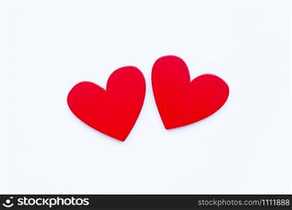 Red wooden hearts on white background, Valentines day concept