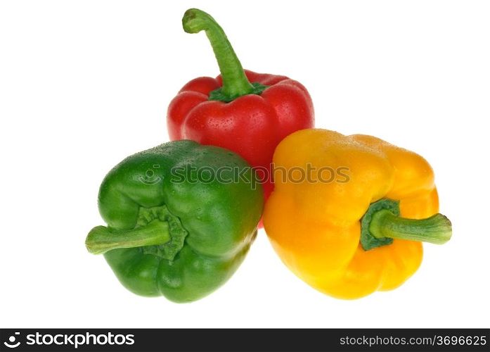 Red, yellow and green bell peppers isolated on the white background