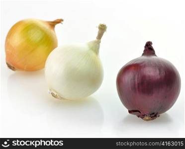 red, yellow and white onions