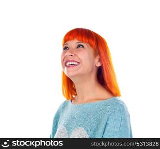 Redhead girl looking up isolated on a white background