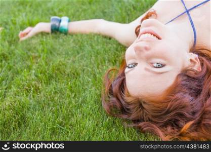 redhead on grass closeup