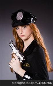 Redhead police office with gun