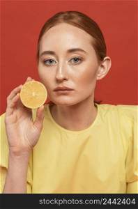 redhead woman posing with lemons 4