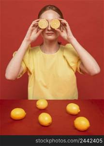 redhead woman posing with lemons 5