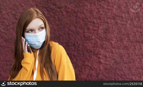 redhead woman wearing face mask with copy space 2