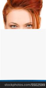 redhead woman with blank board over white