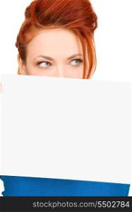 redhead woman with blank board over white