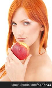 redhead woman with red apple over white