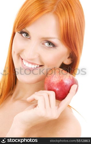 redhead woman with red apple over white