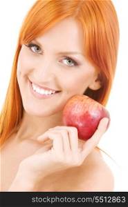 redhead woman with red apple over white