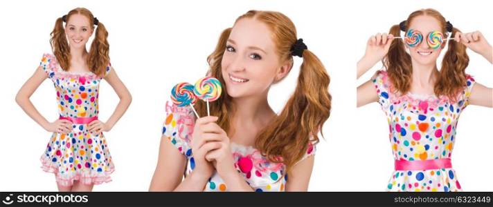 Redhead young girl with lolipops isolated on white