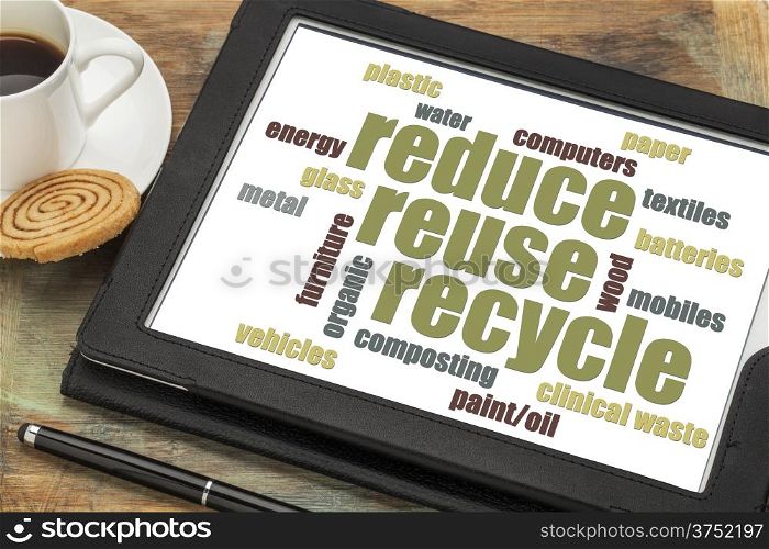 reduse, reuse, recycle word cloud on a digital tablet with a cup of coffee
