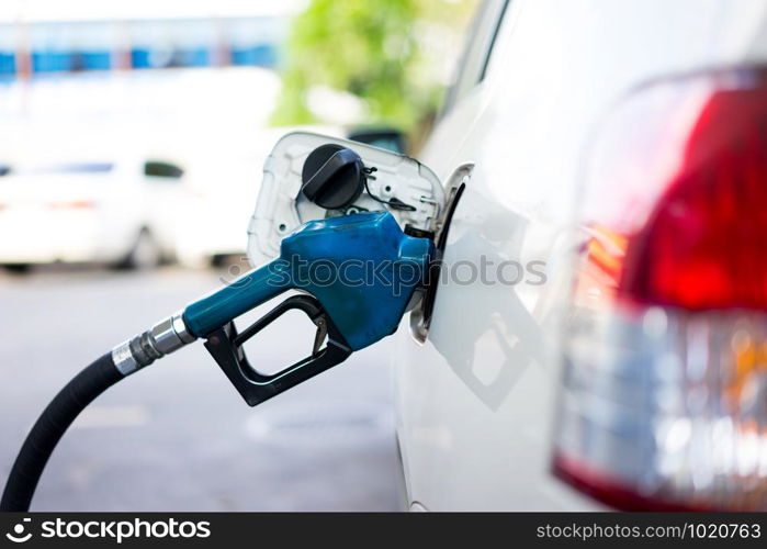 Refill fuel to a car at gas station