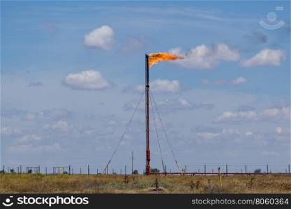 refinery fire gas torch. flaring of associated gas at oil refinery