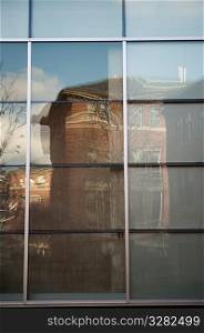Reflection in a window on Harvard University campus in Boston, Massachusetts, USA