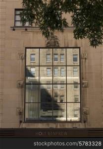 Reflection in the window of a Department Store at Golden Square Mile, Montreal, Quebec, Canada