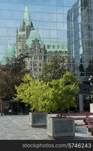 Reflection of a building on another building, Parliament Hill, Ottawa, Ontario, Canada