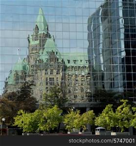 Reflection of a building on another building, Parliament Hill, Ottawa, Ontario, Canada