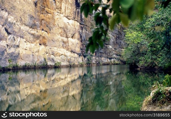 Reflection of a cliff in water