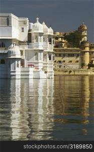 Reflection of a hotel in a lake, Lake Palace, Lake Pichola, Udaipur, Rajasthan, India