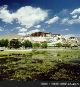Reflection of a palace in water, Potala Palace, Lhasa, Lhasa Valley, Tibet, China