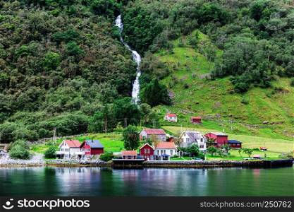 Reflection of a small town in norwegian fiord, Norway