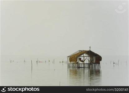 Reflection of a stilt house in water, Cienaga, Atlantico, Colombia