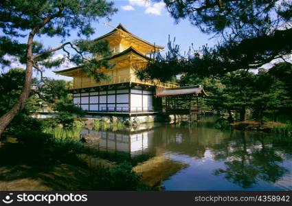 Reflection of a temple in water, Golden Pavilion, Kyoto, Japan