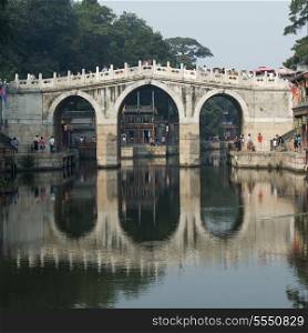 Reflection of an archway on a lake, Summer Palace, Suzhou Street, Haidian District, Beijing, China