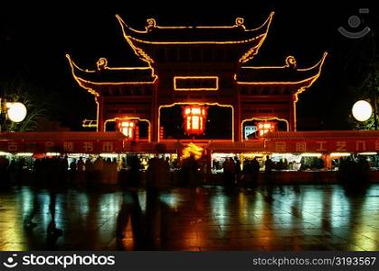 Reflection of an illuminated temple in water, Nanjing, Jiangsu Province, China