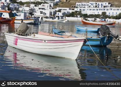 Reflection of boats in the sea, Mykonos, Cyclades Islands, Greece