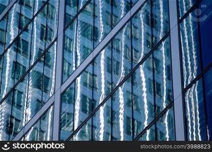 Reflection of building in glass